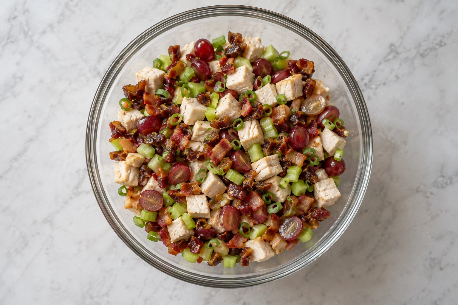 Chicken, bacon, dates, grapes, scallion and celery before mayonnaise