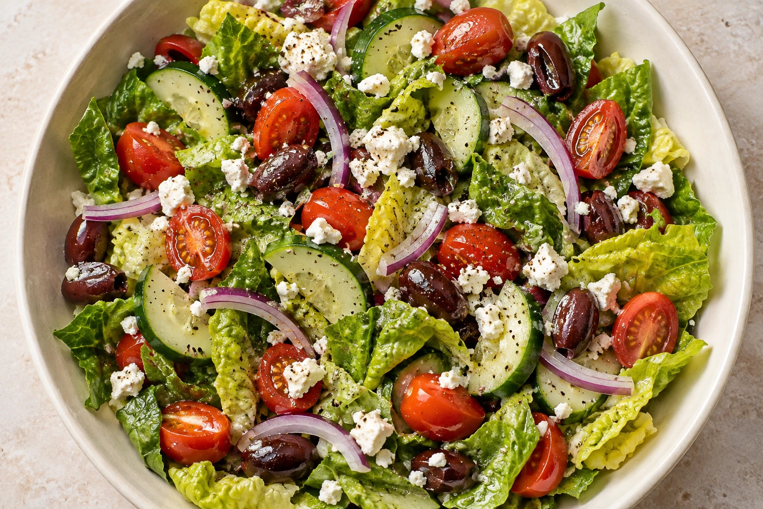 Overhead Greek salad with feta and cider vinaigrette