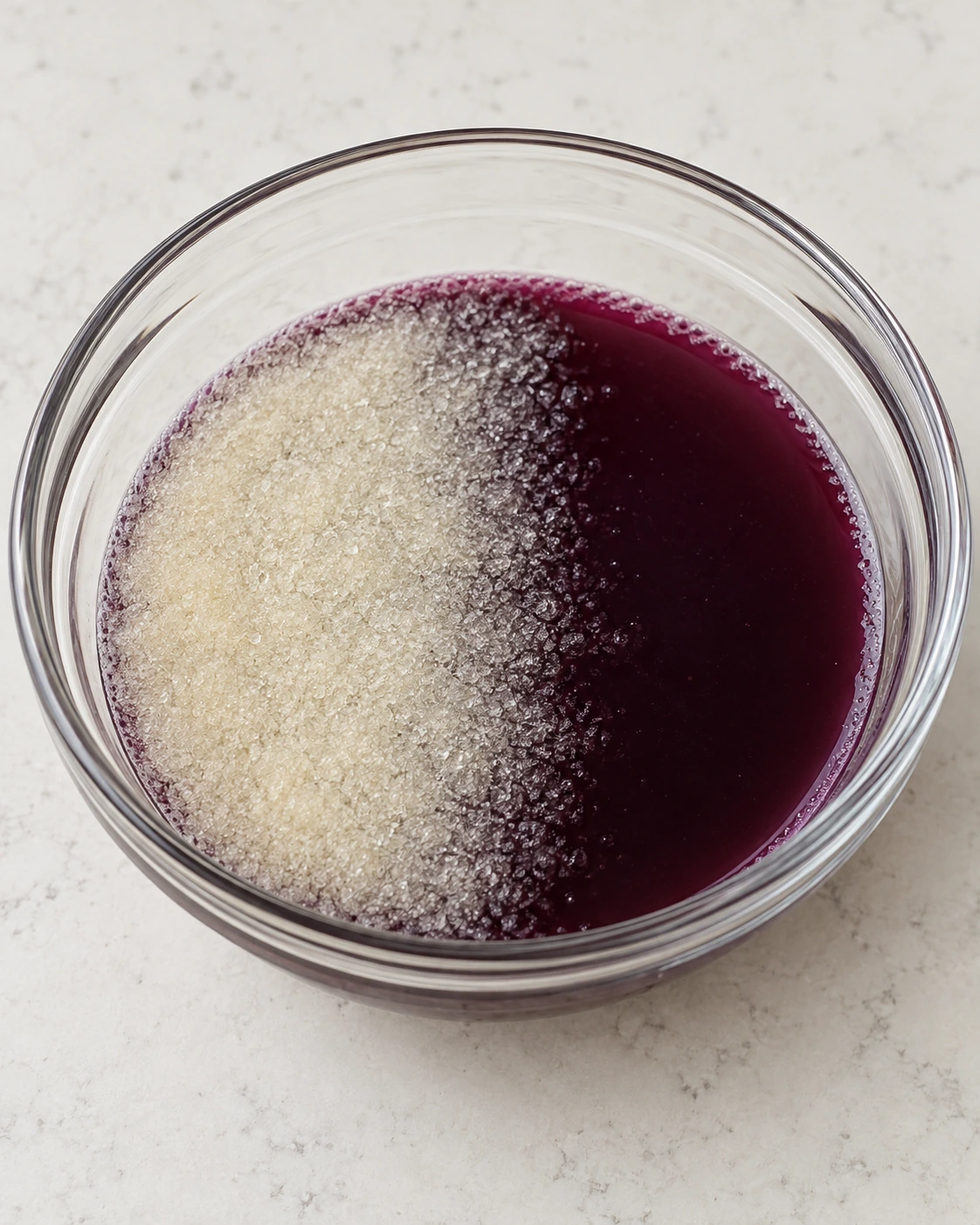 Two tablespoons gelatin blooming in half a cup of Concord grape juice