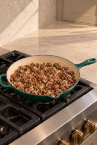 Ground beef cauliflower rice and spices in an Artichaut skillet