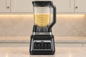 Herb-flecked egg and cultured dairy custard in a Ninja BN801 pitcher
