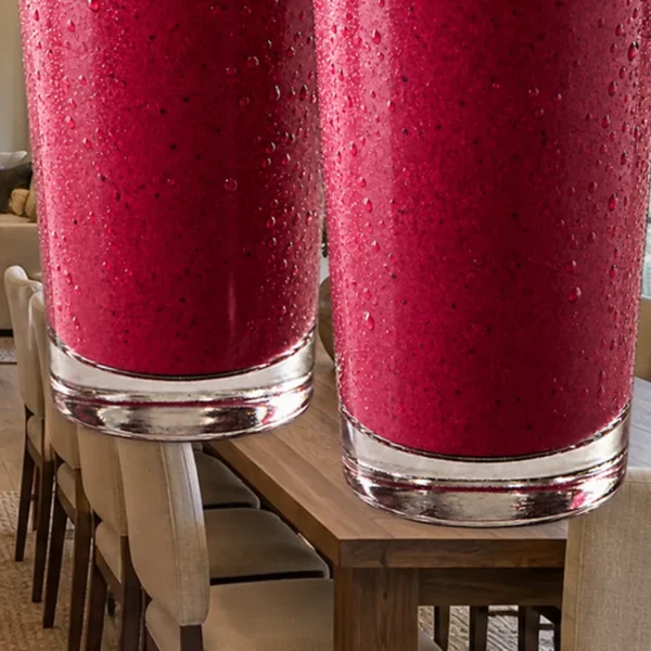 Two deep-pink rose petal beet smoothies for Full GAPS in clear glasses in the WFLI Photo House