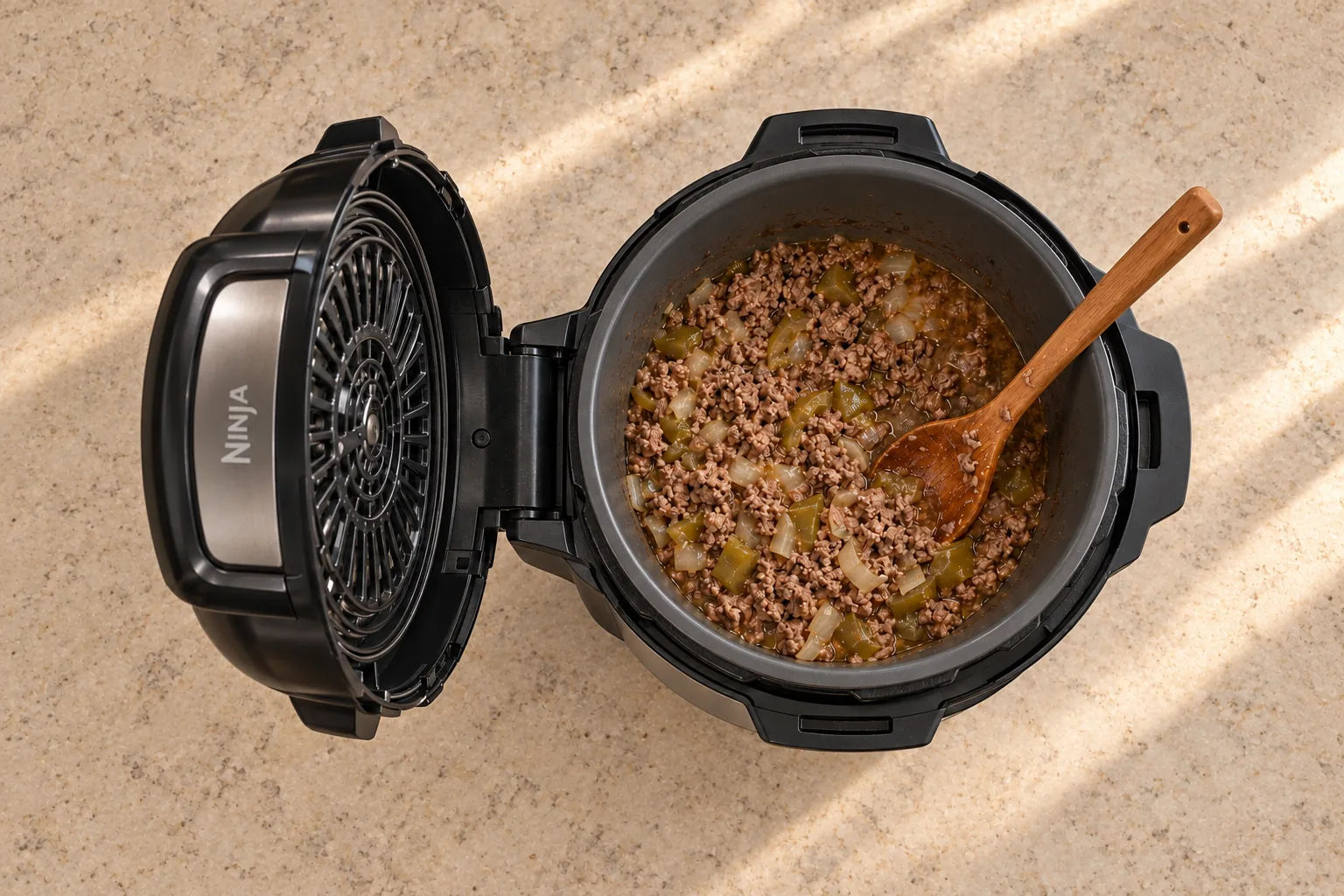 Seven-hour tender ground beef onion and bell pepper in the exact Ninja Foodi FD401 before tomatoes