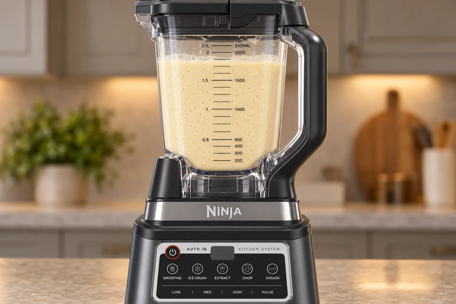 Smooth egg yogurt-cheese and prepared-almond batter in the exact Ninja BN801 pitcher