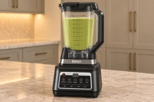 Cooled creamy zucchini cauliflower soup blended in the Ninja BN801