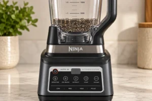 Whole chia seeds in a Ninja BN801 pitcher ready to grind